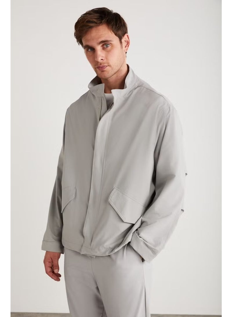 GRIMELANGE Roger Men's Stretch Technical Fabric Thick Zippered Lined Sleeve Cuffed Flap Pocket Gray Jacket - Image 1